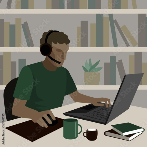 A young man in headphones with a microphone is working on a laptop. There are mugs and books on the table. Drawing in a flat style.