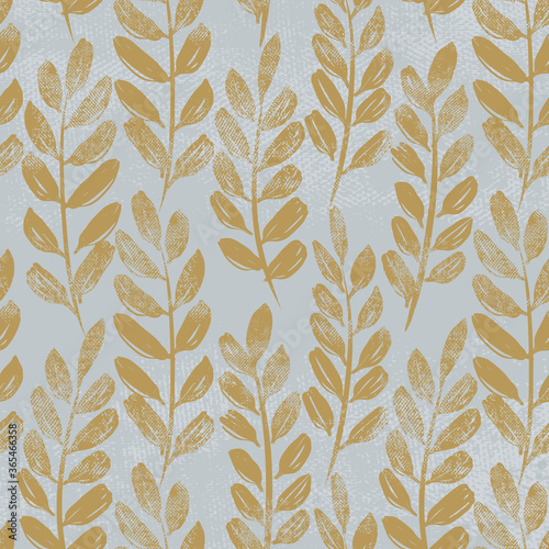 Seamless pattern of grass and leaves on a beige background.