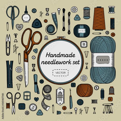 Sewing accessories set. Handmade, sewing, embroidery, needlework supplies on a beige background.