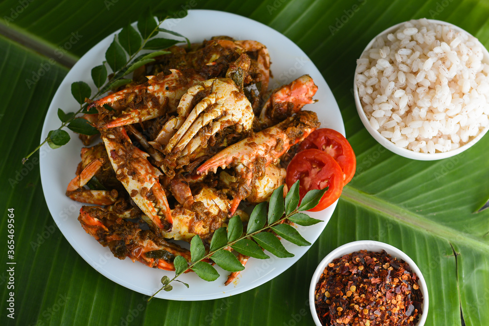 Chili crab curry or Kerala crab roast and rice, popular hot and spicy