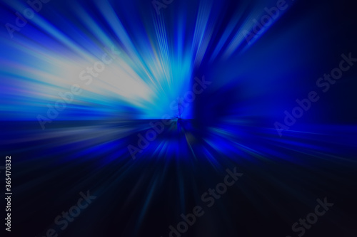 Abstract blurred radial vibrant navy blue color background.