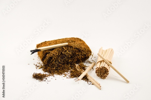 Indonesian traditional high-quality tobacco on a white background photo