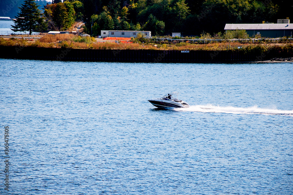 Fototapeta premium Speedboat off Bainbrige island in Puget Sound part of the city of Seatle USA