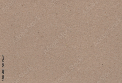 Textured brown coloured carton paper background. Extra large highly detailed image.