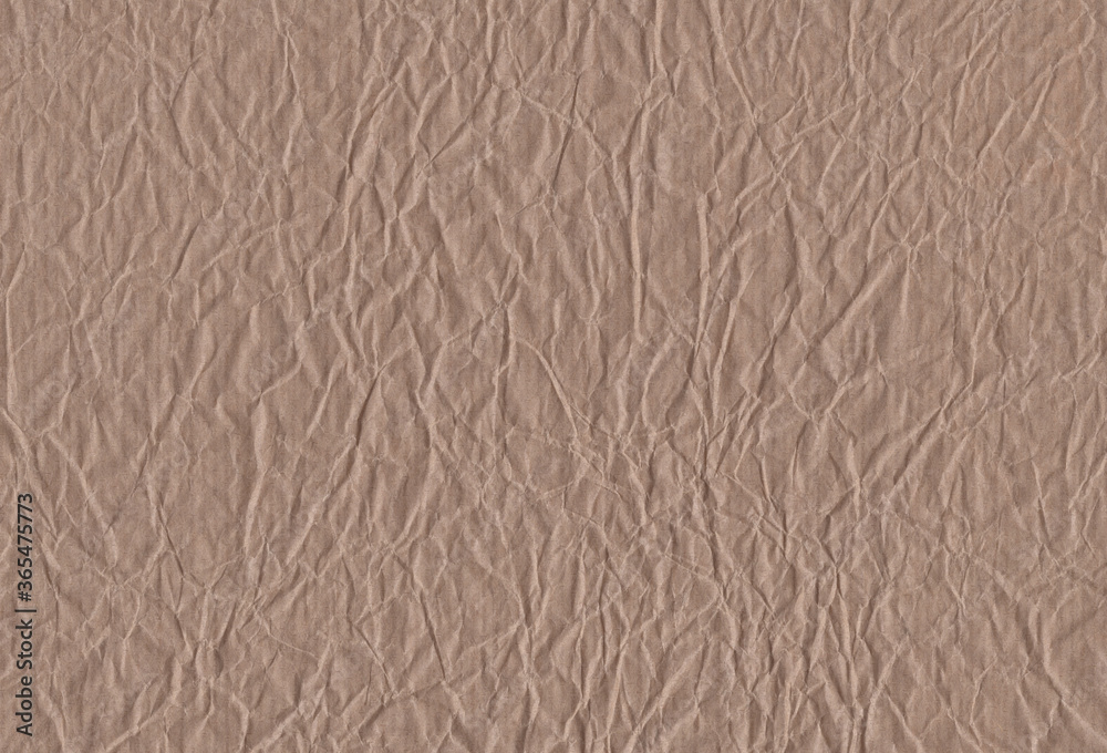 Sheet of crumpled brown craft paper background. Extra large highly detailed image. Sheet of crumpled brown craft paper background. Extra large highly detailed image.