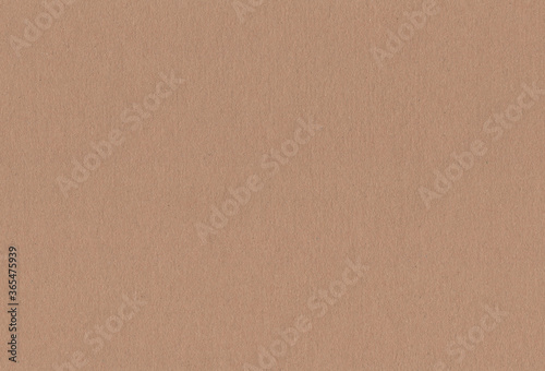 Textured brown coloured carton paper background. Extra large highly detailed image.