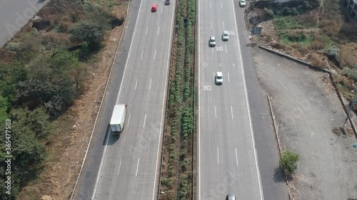 Wallpaper Mural Top-down view of the Multi-Lane Highway traffic of Pune Mumbai Expressway aerial drone footage - road travel & road safety in India Torontodigital.ca