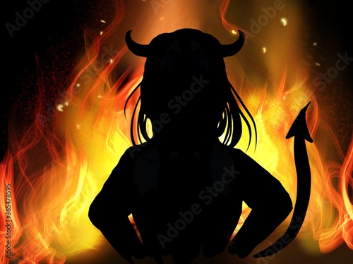 Silhouette of woman’s devil  standing in front of flame 