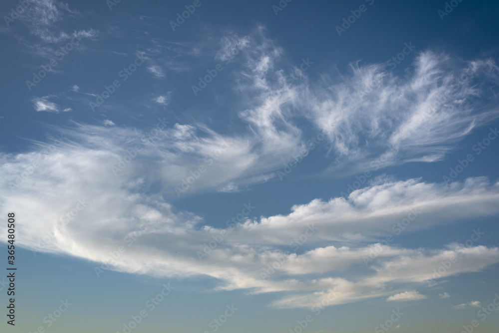 Fototapeta premium Blue sky with white clouds. Abstract background.