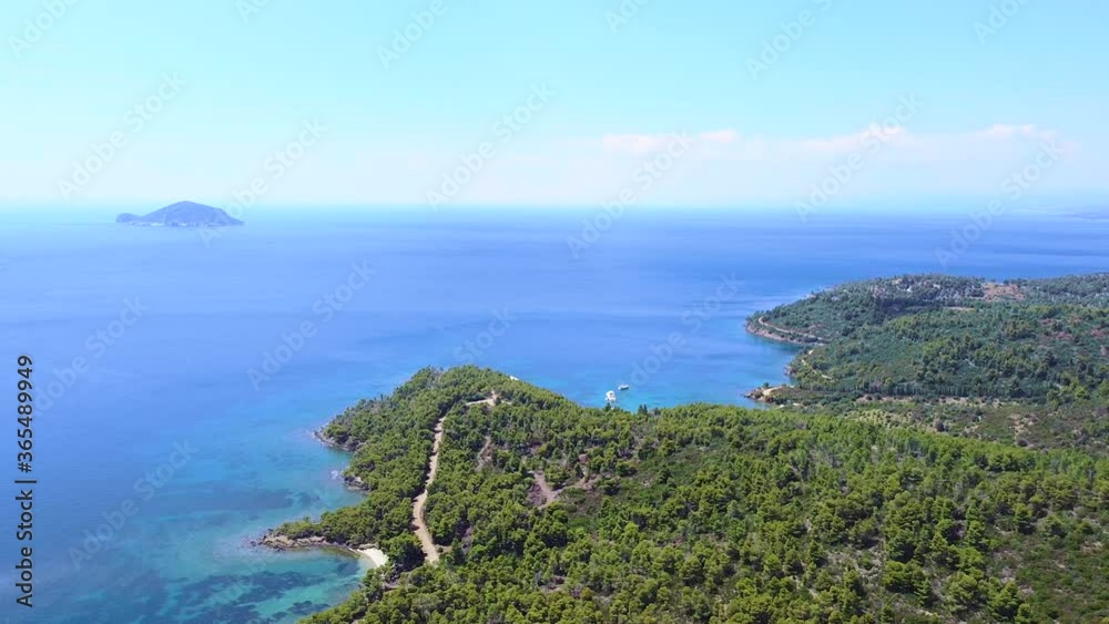 Travel touristic vacation destination. Aerial view of sea coast and beautiful blue open sea with island Travel touristic vacation destination. Aerial view of sea coast and beautiful blue open sea with island