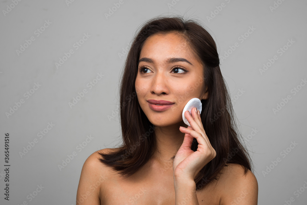 Portrait of young beautiful Asian woman shirtless Portrait of young beautiful Asian woman shirtless