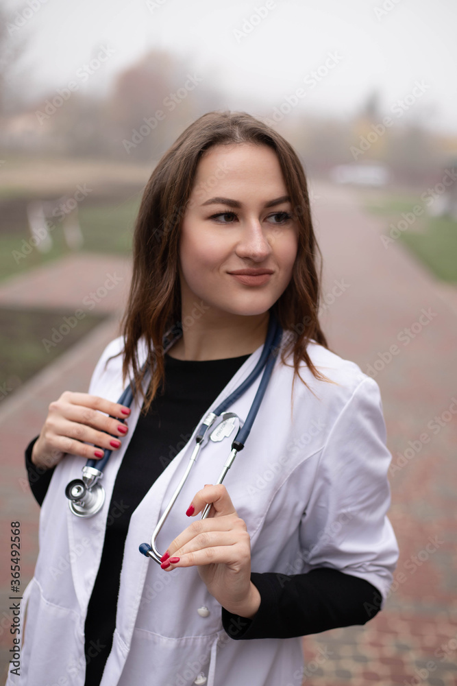 young handsome doctor with a stethoscope around his neck, medical student, interns, security snooth young handsome doctor with a stethoscope around his neck, medical student, interns, security snooth