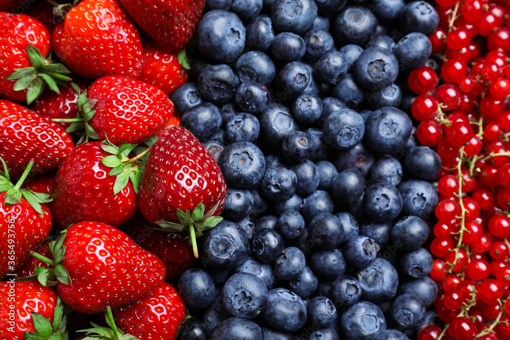 Mix of different ripe tasty berries as background, top view Mix of different ripe tasty berries as background, top view