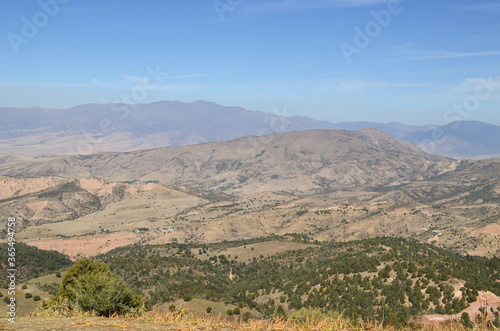 Beautiful landscape, mountains of Uzbekistan. Against the background of mountains and trees. Beldersay.