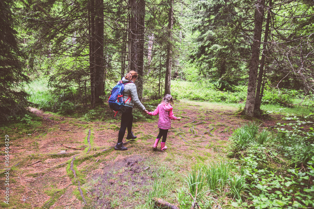 Obraz premium Family hiking in beautiful summer forest, Healthy Active Lifestyle , Mother And Daughter Walking In Nature