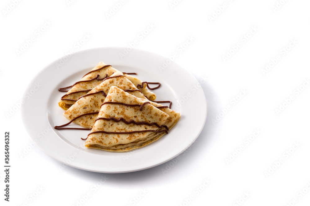 Sweet crepes with chocolate isolated on white background. Copy space Sweet crepes with chocolate isolated on white background. Copy space