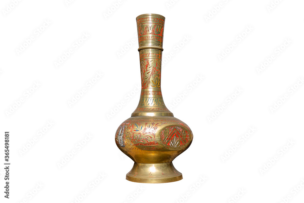 A long, ancient vase made of brass with colorful decorations, isolated on a white background with a clipping path. A long, ancient vase made of brass with colorful decorations, isolated on a white background with a clipping path.