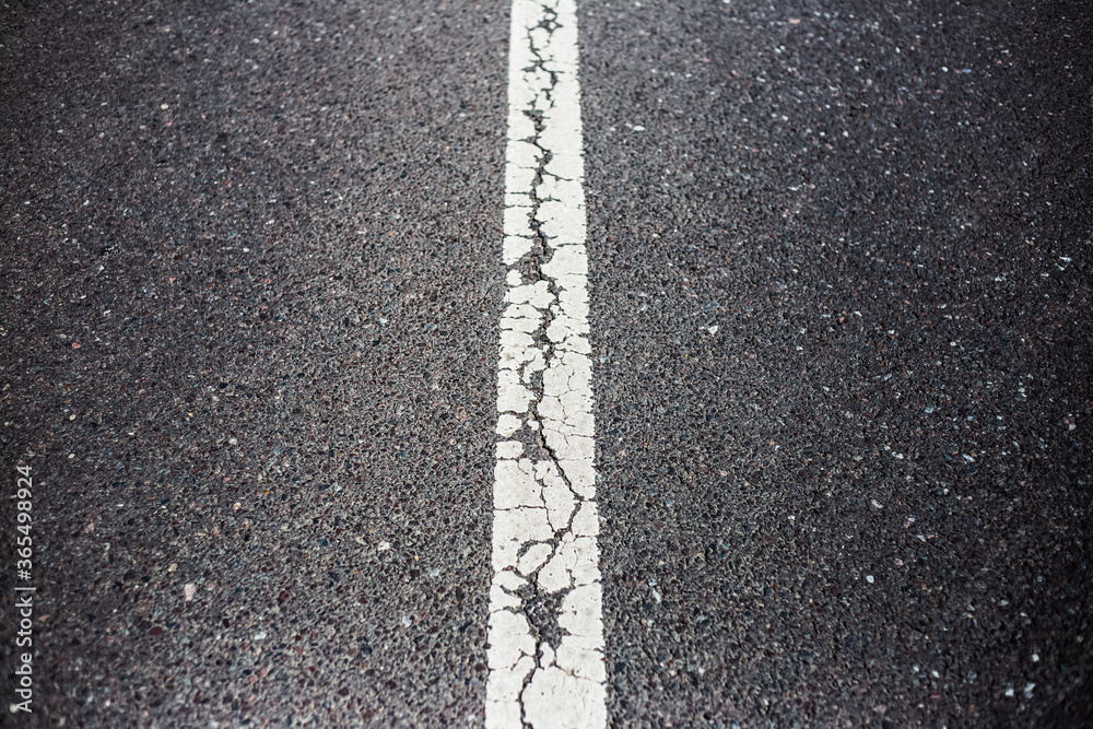 Fototapeta premium White dividing line on asphalting road.