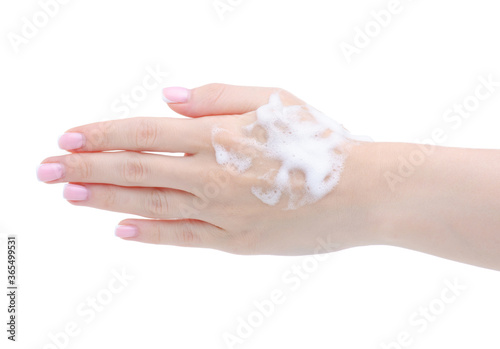 Hand with panthenol foam on white background isolation