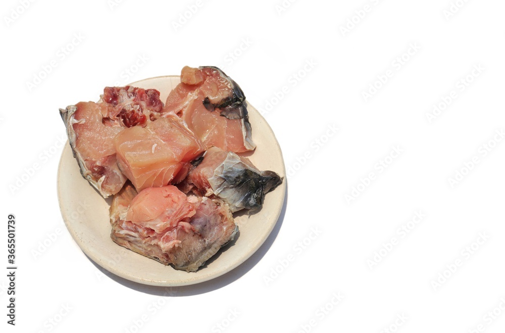 Rohu Fish Cut Pieces in a Plate Isolated on White Background with Copy Space for Texts Writing Rohu Fish Cut Pieces in a Plate Isolated on White Background with Copy Space for Texts Writing