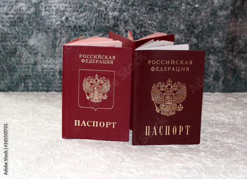 Passport of the Russian Federation and passport of the Donetsk people's Republic . The inscription in Russian: Russian Federation, passport, Donetsk people's Republic photo