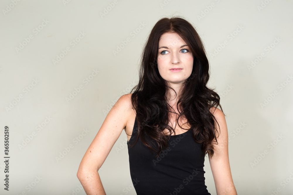 Portrait of young beautiful woman with brown hair Portrait of young beautiful woman with brown hair