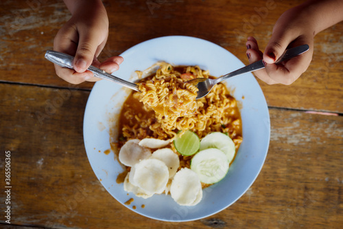 Spicy noodles with Hot chilli sauce - Indonesian cuisine food