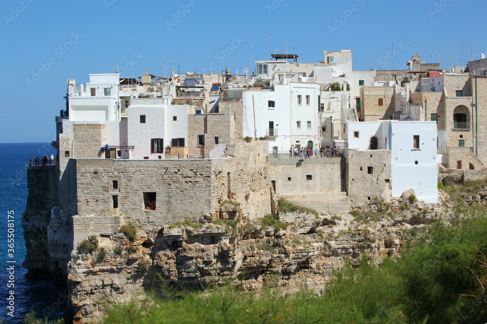 View of Polignano a mare, picturesque little town on cliffs of the Adriatic Sea. Apulia, Southern Italy.