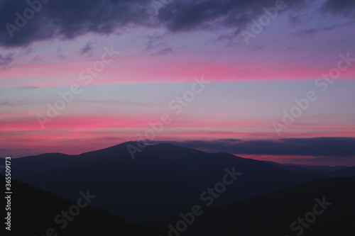 Panoramic view of the sunset in the Carpathian mountains. © Myshkovskyi
