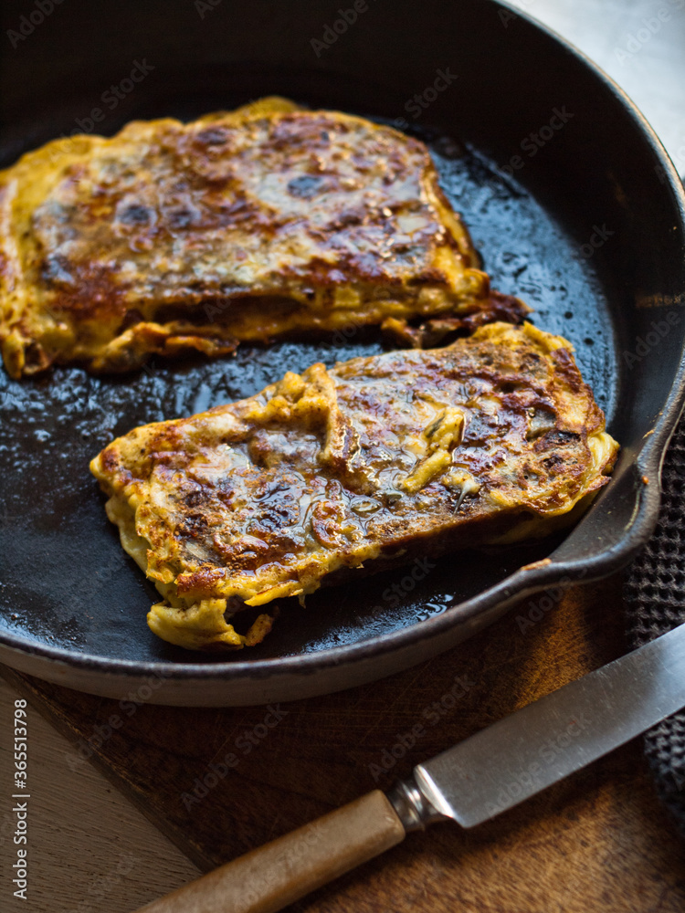 Rustic french toast in cast iron pan. Rustic french toast in cast iron pan.