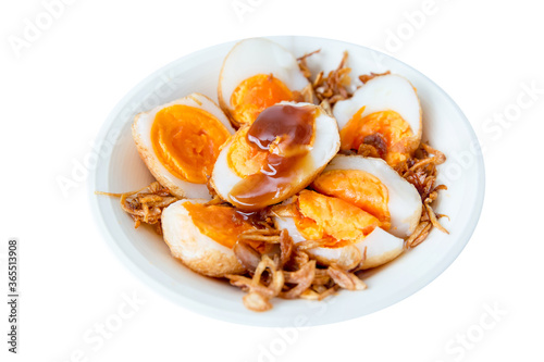 Top view of Sweet and sour eggs on white background