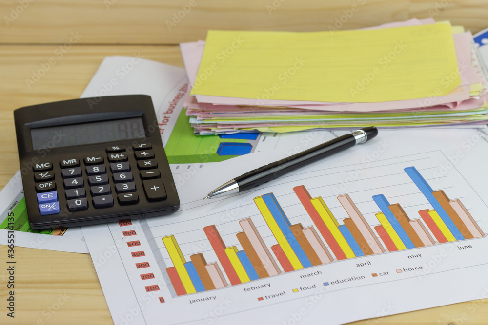 pile of papers with Calculator at work office for business on the table, concept document in work office pile of papers with Calculator at work office for business on the table, concept document in work office