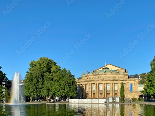 The Stuttgart State Theatre Opera building and fountain in Eckensee lake, Germany.