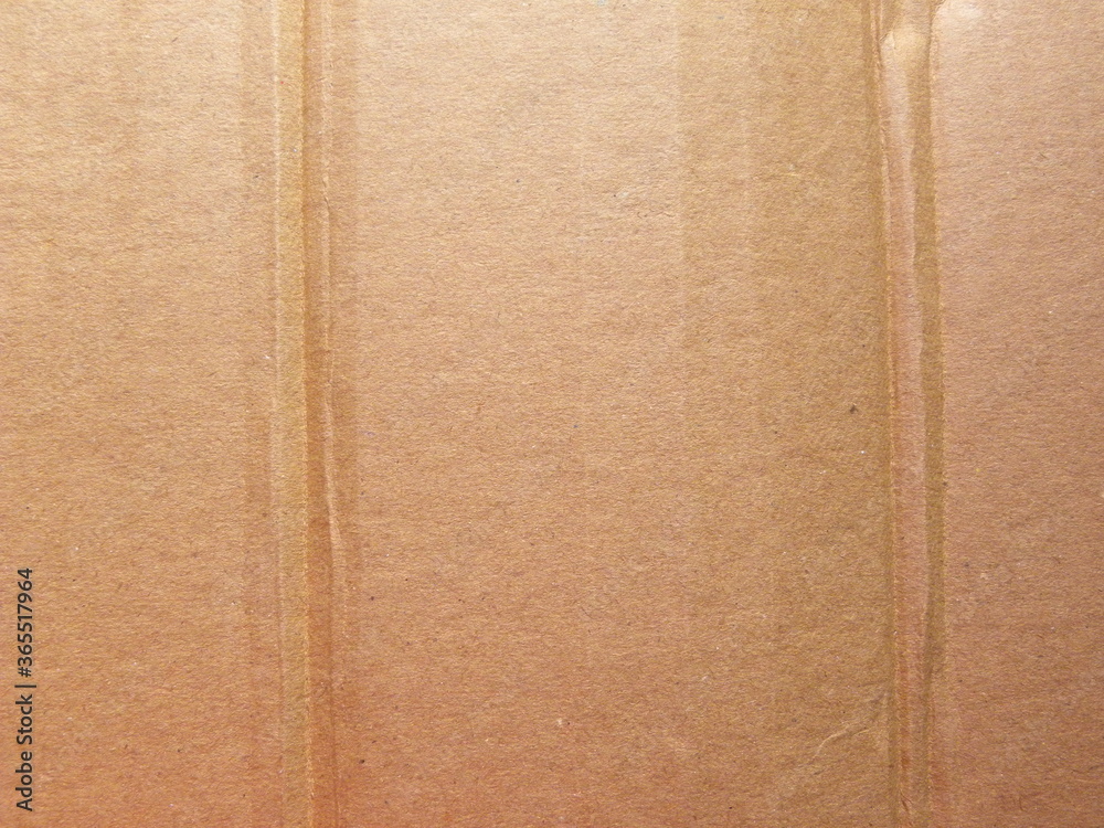 Fototapeta premium Beige cardboard box textured background with wrinkles