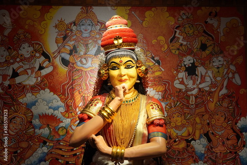 Close Up of a wax figure of Beautiful Indian girl dancing classical traditional Indian dance Mohiniyattam at Kochi Airport. Mohiniattam artist statue. : Kochi India - July 2020