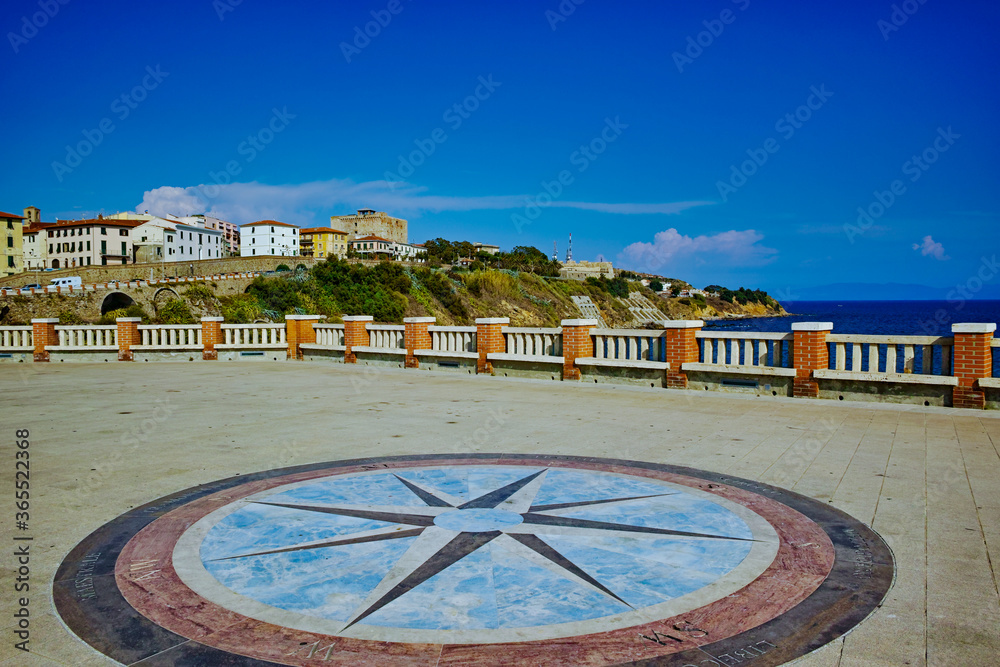 Naklejka premium City panorama with the compass rose of Piazza Bovio Piombino Tuscany Italy