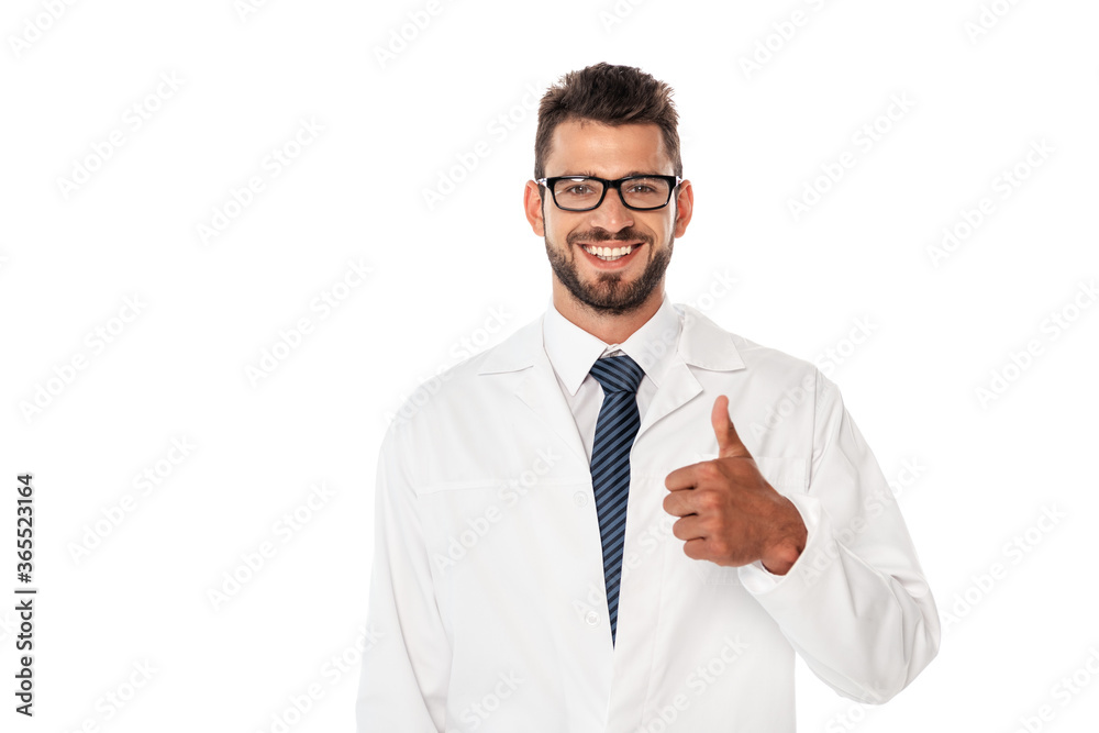 Smiling doctor in white coat showing thumb up isolated on white Smiling doctor in white coat showing thumb up isolated on white