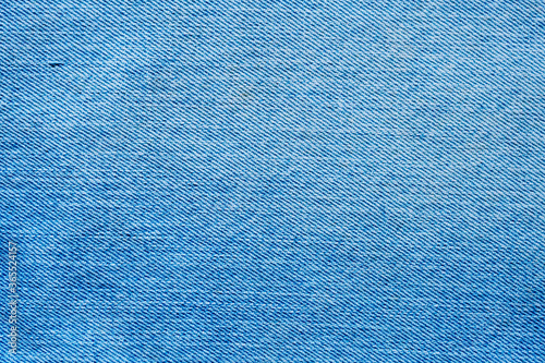 Denim blue jeans texture close up background top view