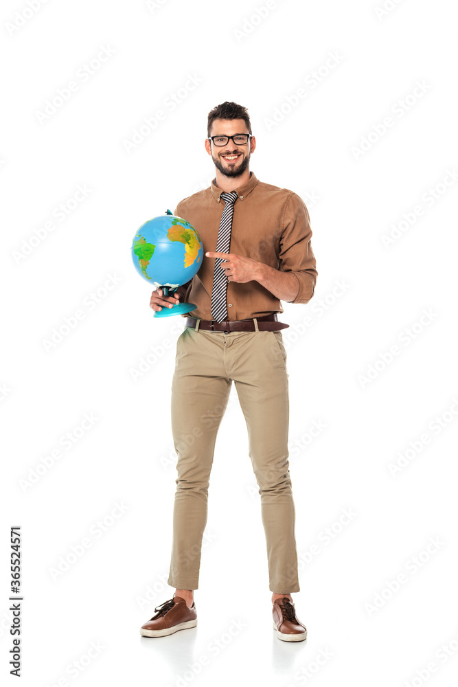 Smiling teacher pointing with finger at globe on white background Smiling teacher pointing with finger at globe on white background