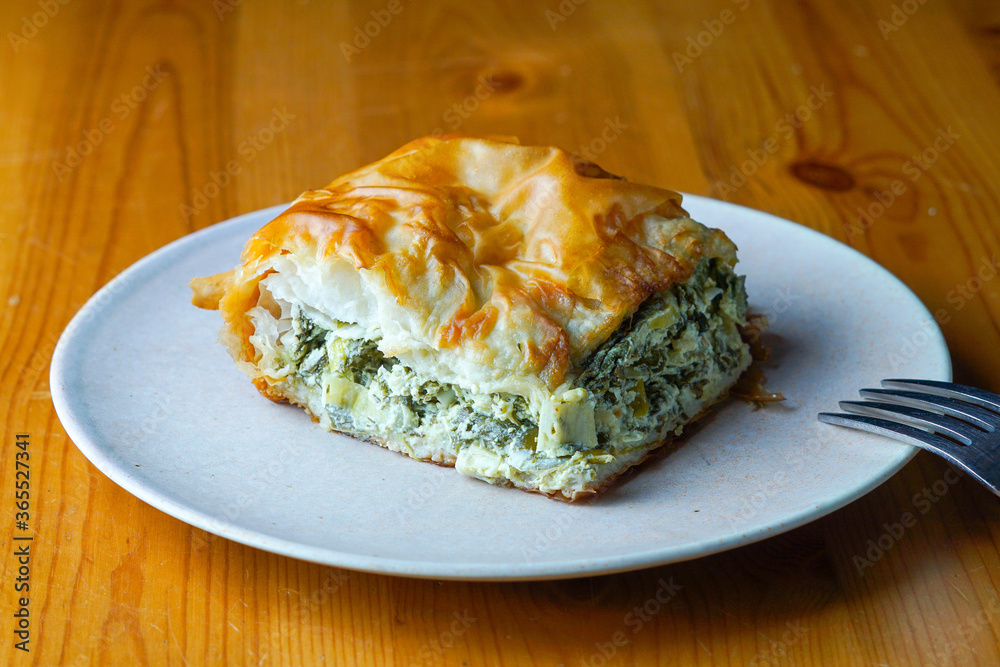 Spinach pie on a plate Spinach pie on a plate