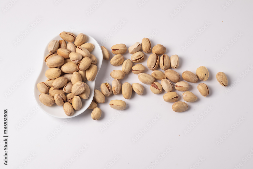 Pistachios Bake on a white background