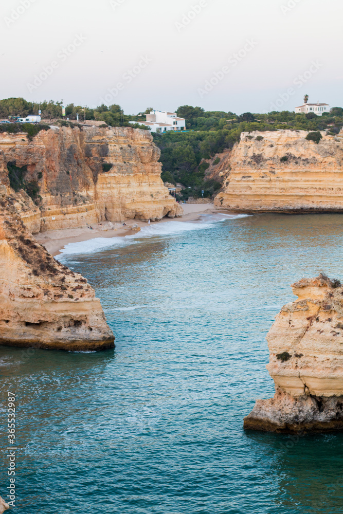 Obraz premium Algarve, Lisbon. Beautiful bay near Lagos town with high cliffs on the shore of the Atlantic Ocean. The Algarve is the southernmost region of continental Portugal. 