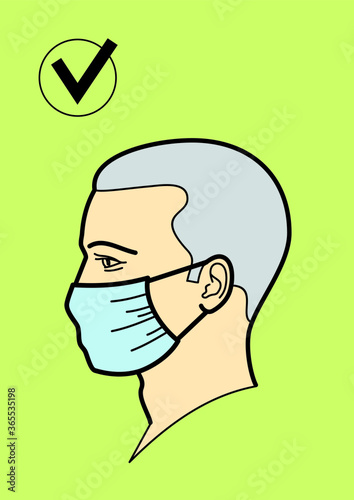 The head of a man in a medical mask. Correct wearing of a medical mask during a viral epidemic or pandemic.