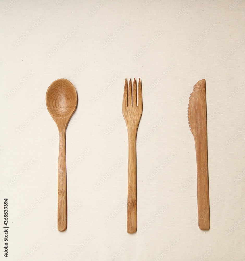 Handcraft wooden spoon, fork and knife on isolated white background, Sao Paulo, Brazil Handcraft wooden spoon, fork and knife on isolated white background, Sao Paulo, Brazil