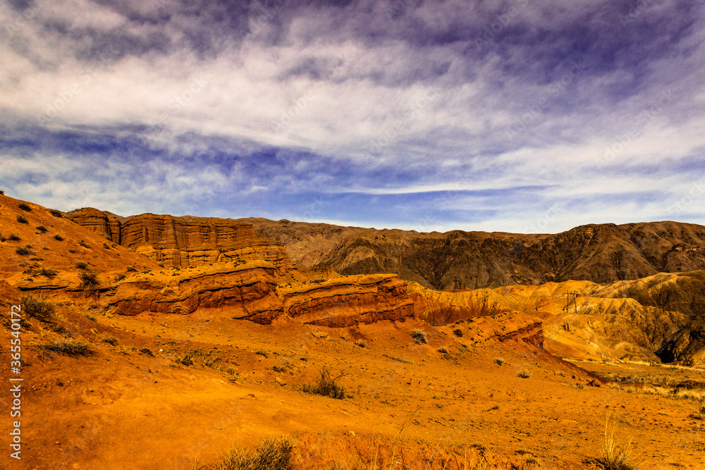 Fototapeta premium landscape, desert, canyon, rock, nature, mountain, sky, red, travel, kyrgyzstan, suluu terek, mountains, valley, blue, park, utah, scenic, sunset, sandstone, clouds, outdoors, view, stone