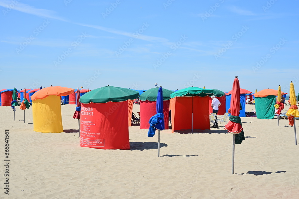 A beautiful Day full of blue at the Beach. Deauville, Normandy, France. A beautiful Day full of blue at the Beach. Deauville, Normandy, France.
