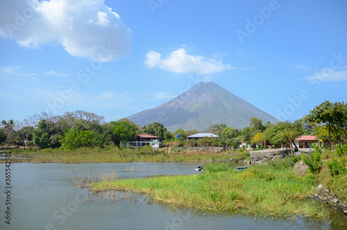 View in Ometepe island with Concepcion volcano in the background surrounded by nature. Lake in Central America.