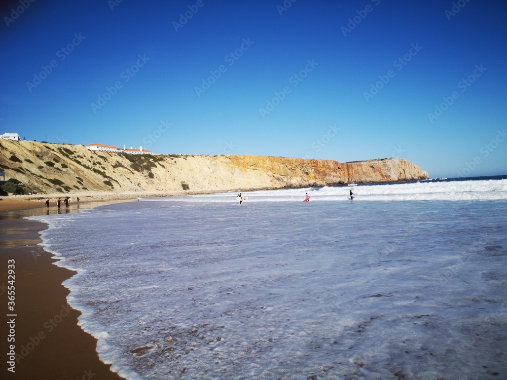 Praia da Mareta beach in Sagres and is a popular beach for surfing