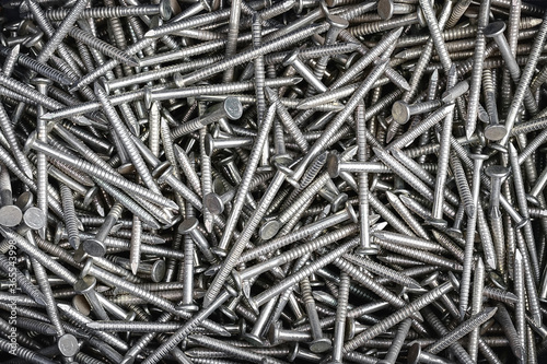 steel fluted nails background 