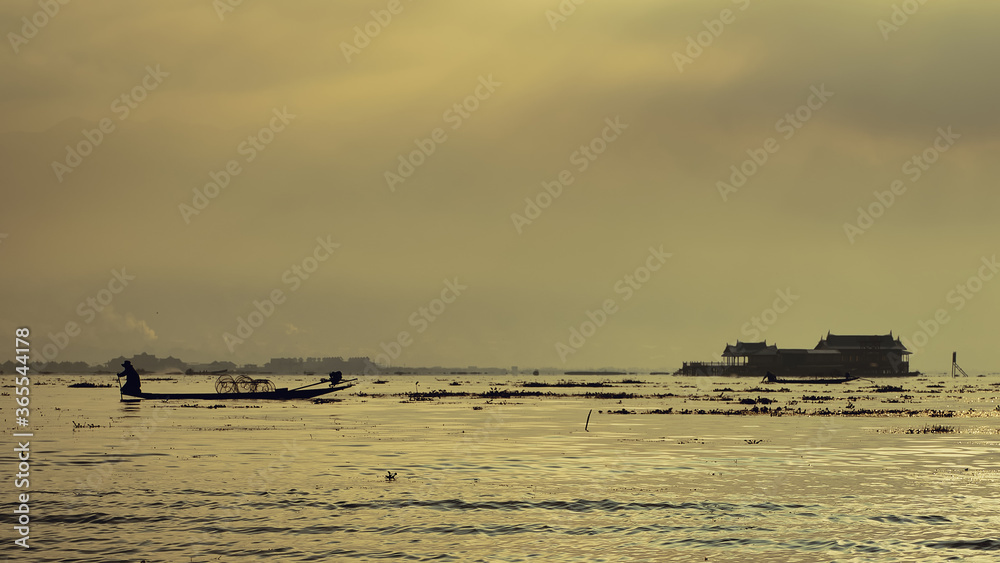 Myanmar Inle Lake Burmese Fisherman On Boat Catching Fish By Traditiona